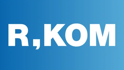Logo der R-KOM